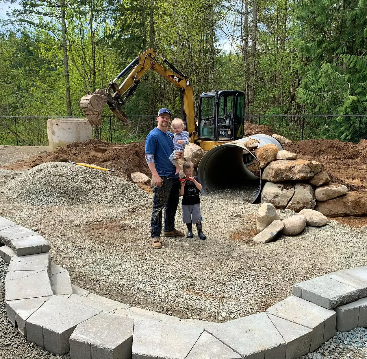 Puget sound excavating founder with his children